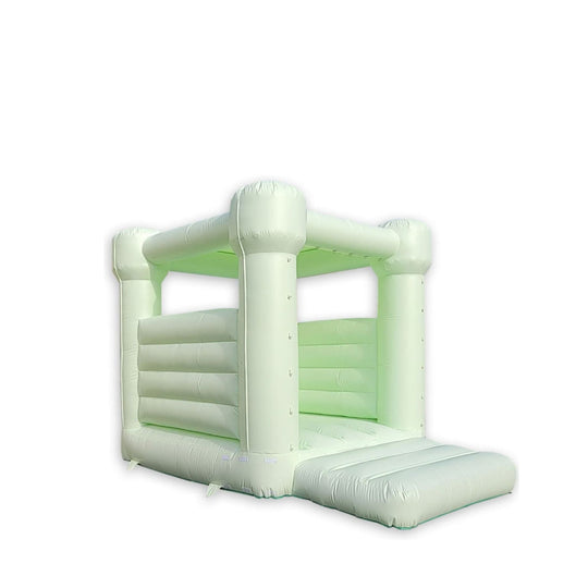 Pastel green inflatable castle with a spacious jumping area, ideal for outdoor events. Pastel green inflatable castle with a spacious jumping area, ideal for outdoor events.