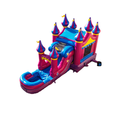Colorful pink and blue inflatable castle with turrets and a slide, set against a white background, showcasing a commercial