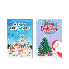 Two festive Christmas banners featuring a snowy village scene and a cheerful Santa with a Christmas tree.