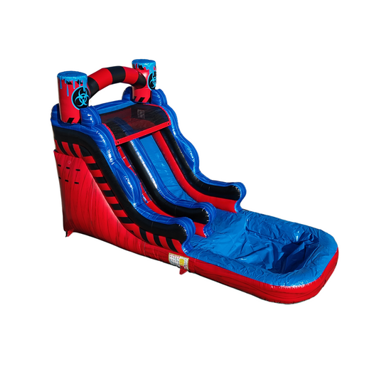 Bright blue and red commercial water slide with a toxic theme, featuring two slides and a splash pool at the bottom.