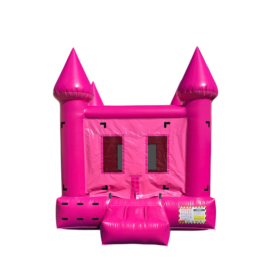 Bright magenta bounce house featuring castle towers and a front entrance, ideal for outdoor events.