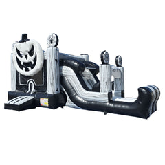 Black and white Halloween-themed inflatable combo featuring a pumpkin design, slide, and bounce area.