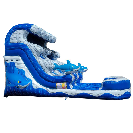 Blue and gray inflatable water slide featuring a shark theme, with a steep slide and splash pool at the bottom.
