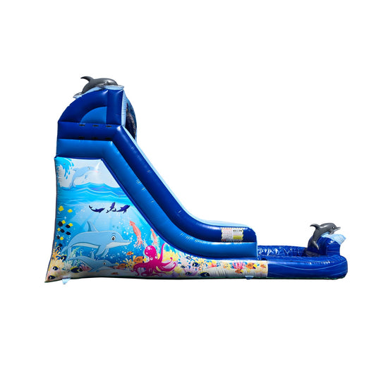A vibrant blue ocean-themed commercial water slide featuring dolphins and sea creatures, designed for outdoor fun.
