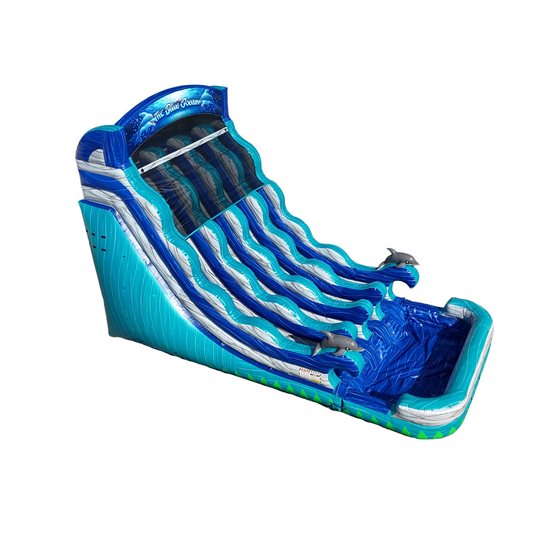 A vibrant blue inflatable water slide with dolphin accents, featuring multiple sliding lanes and a splash pool at the base