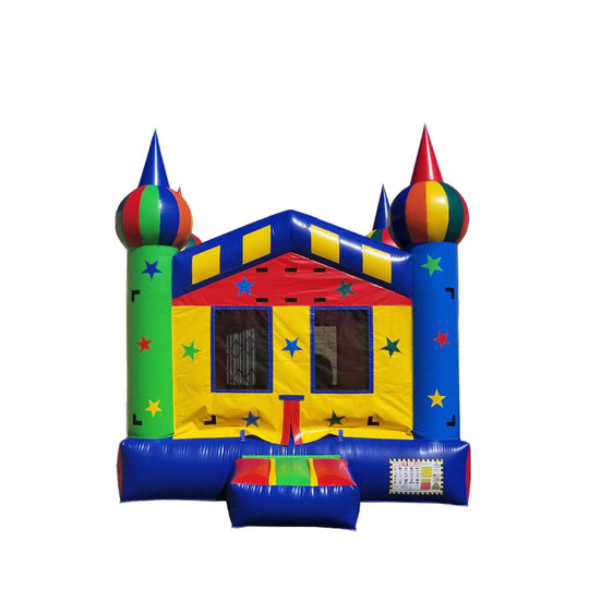 Colorful B-484 Starry Night Castle bounce house with star patterns and tall, pointed towers, set against a white background.