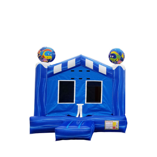 Bright blue Under The Sea Castle bounce house featuring ocean-themed decorations and two colorful balloons on top.