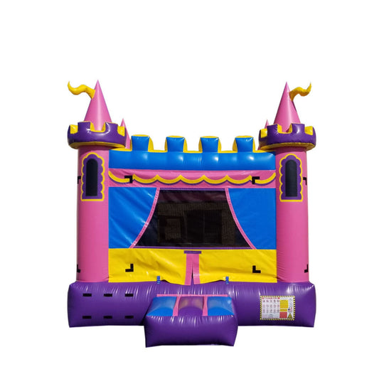 Colorful pink castle bounce house with blue and yellow accents, featuring two towers and a slide entrance.