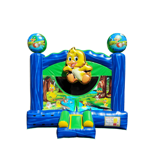 Bright blue commercial bounce house featuring a cheerful duckling design, set against a forest backdrop.