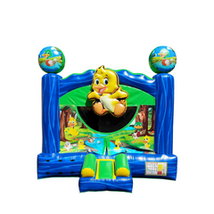 Bright blue commercial bounce house featuring a cheerful duckling design, set against a forest backdrop.
