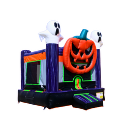 A colorful commercial bounce house featuring a large pumpkin and two ghost decorations, set against a white background.