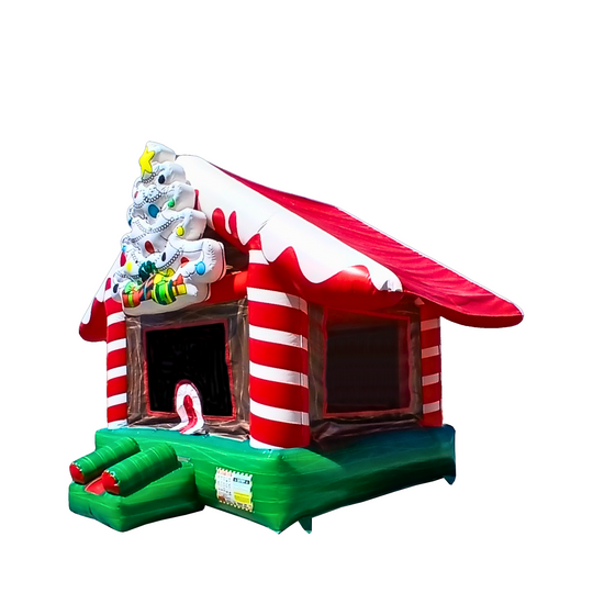 Colorful Christmas-themed bouncy castle with a candy cane design and festive decorations, suitable for holiday events.