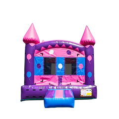A vibrant pink and purple commercial bounce house for sale featuring balloon designs and two tall spires.