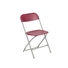 Red plastic folding chair with a silver metal frame, suitable for various events.