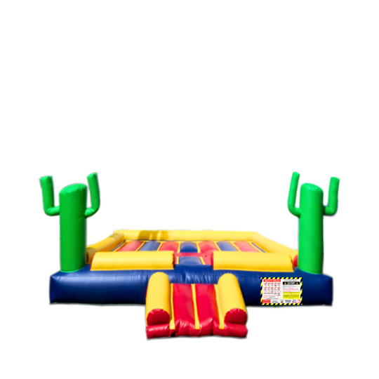 Brightly colored inflatable mechanical bull bed featuring yellow, red, and blue sections with green cactus-shaped pillars on
