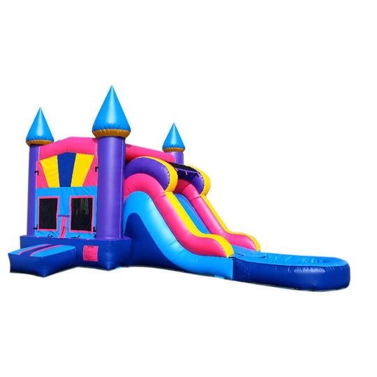 Colorful pink and blue bouncy castle with two slides and castle-like towers, set against a white background, showcasing an