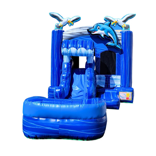Bright blue inflatable combo water slide featuring a dolphin design, with a slide and splash area.
