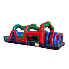 Colorful commercial obstacle course inflatable featuring various climbing and sliding sections, set against a white