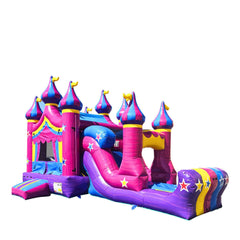 Colorful pink and purple inflatable castle with towers and a slide, designed as a commercial inflatable combo for sale.
