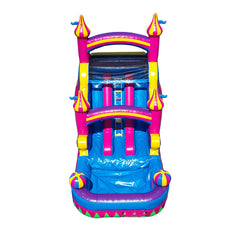 Bright pink castle-themed commercial water slide for sale with blue sliding lanes and a splash pool at the bottom.