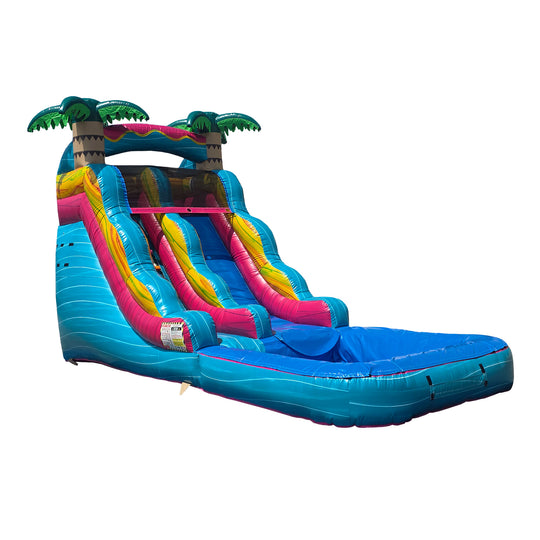 Colorful Esmeralda water slide featuring palm trees, with a blue landing pool, ideal for summer fun.