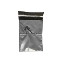 Gray sandbag cover designed for securing a commercial bounce house, featuring a top closure and a sturdy construction.