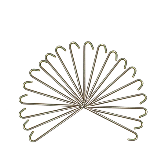 Set of 18-inch metal stakes arranged in a fan shape, suitable for securing a commercial bounce house.